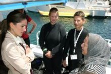 Queen Rania meets the team