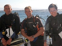 Divers on the beach