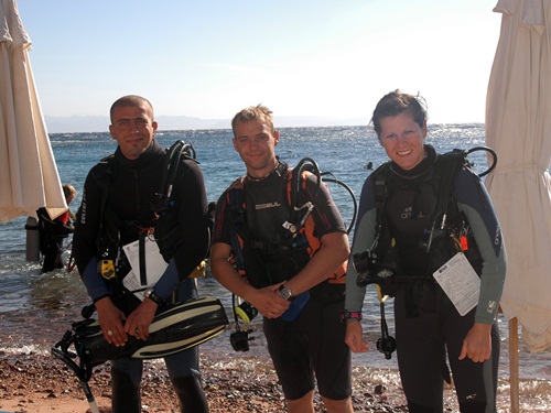 Divers on the beach