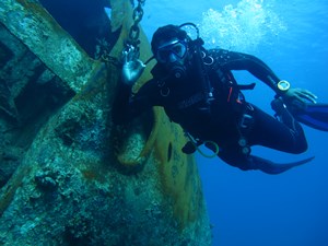 Diver at stern of wreck