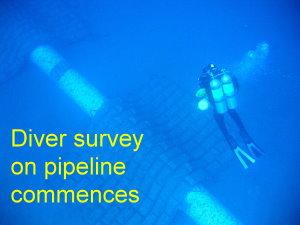 Diver over pipeline