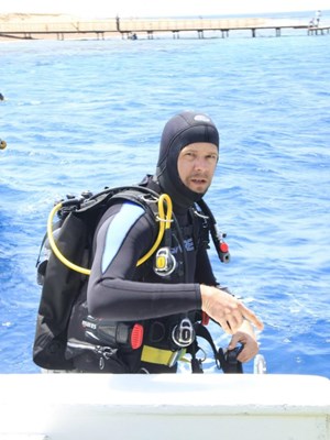 Diver at stern of boat